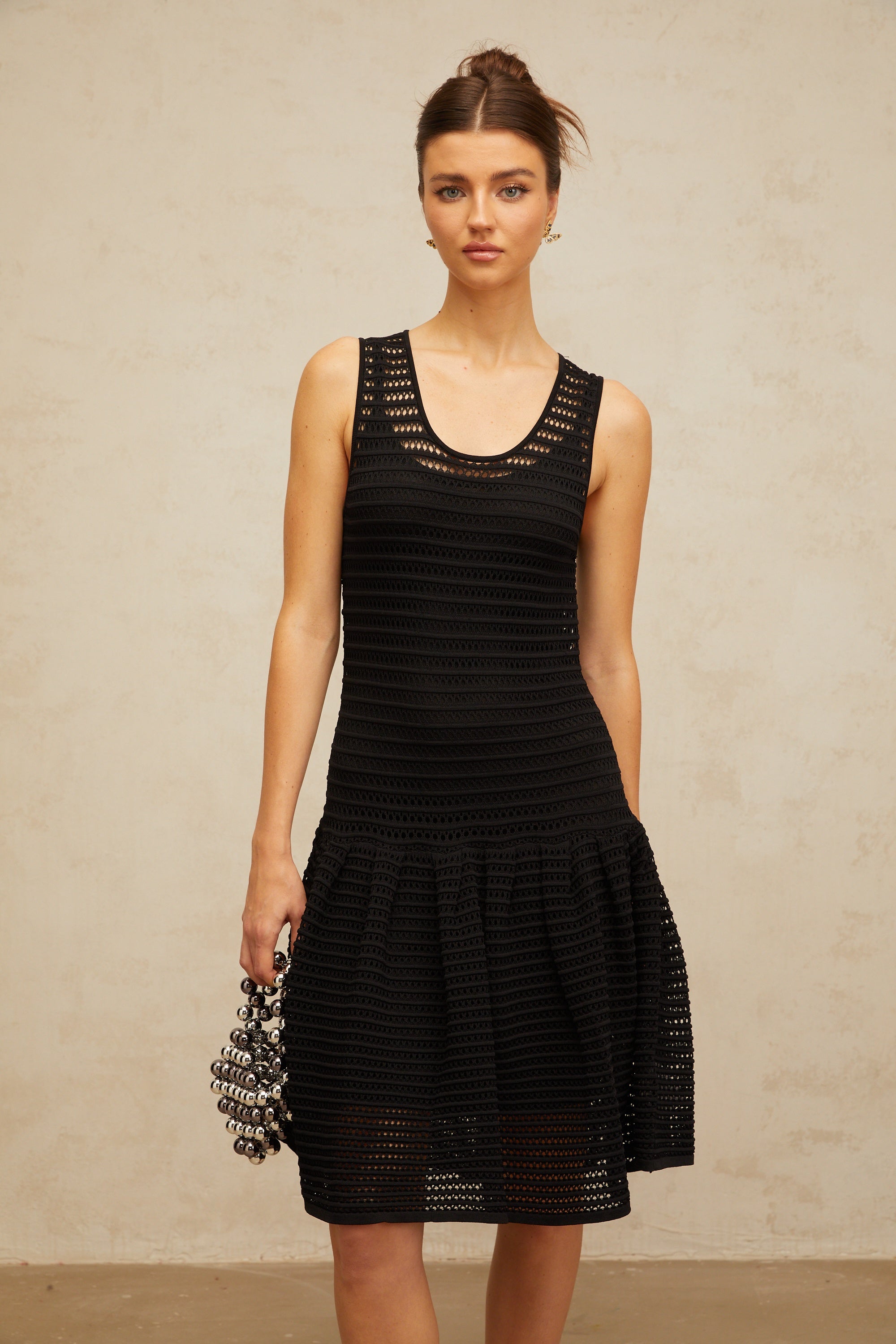 Maelle black flounced pointelle-knit mini dress