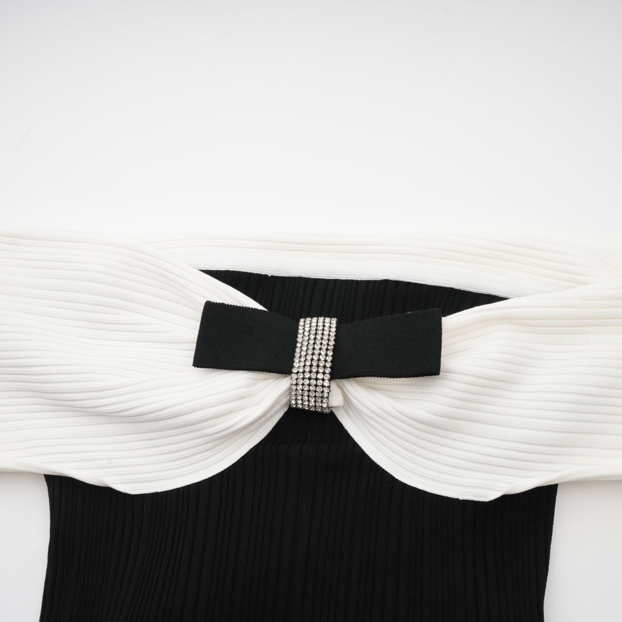 Angèle black off-shoulder knitted mini dress