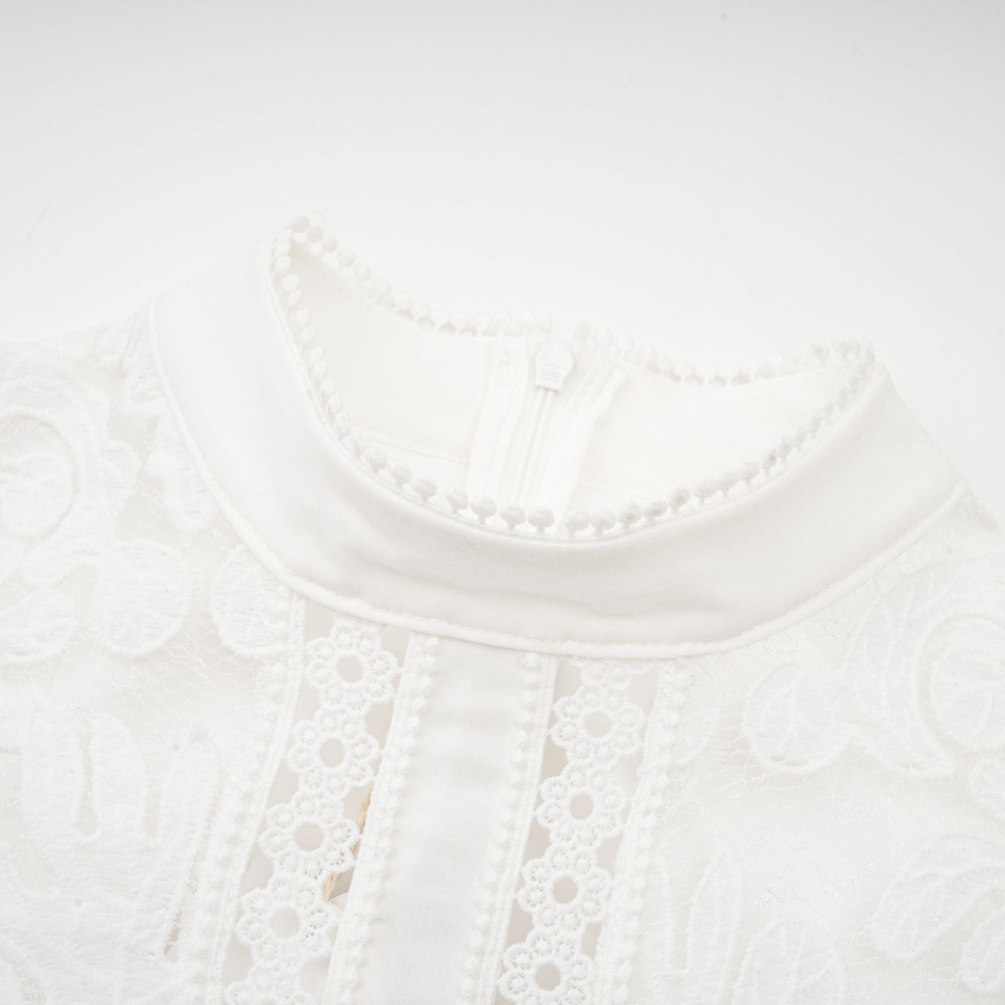 Madeleine white panelled embroidered midi dress