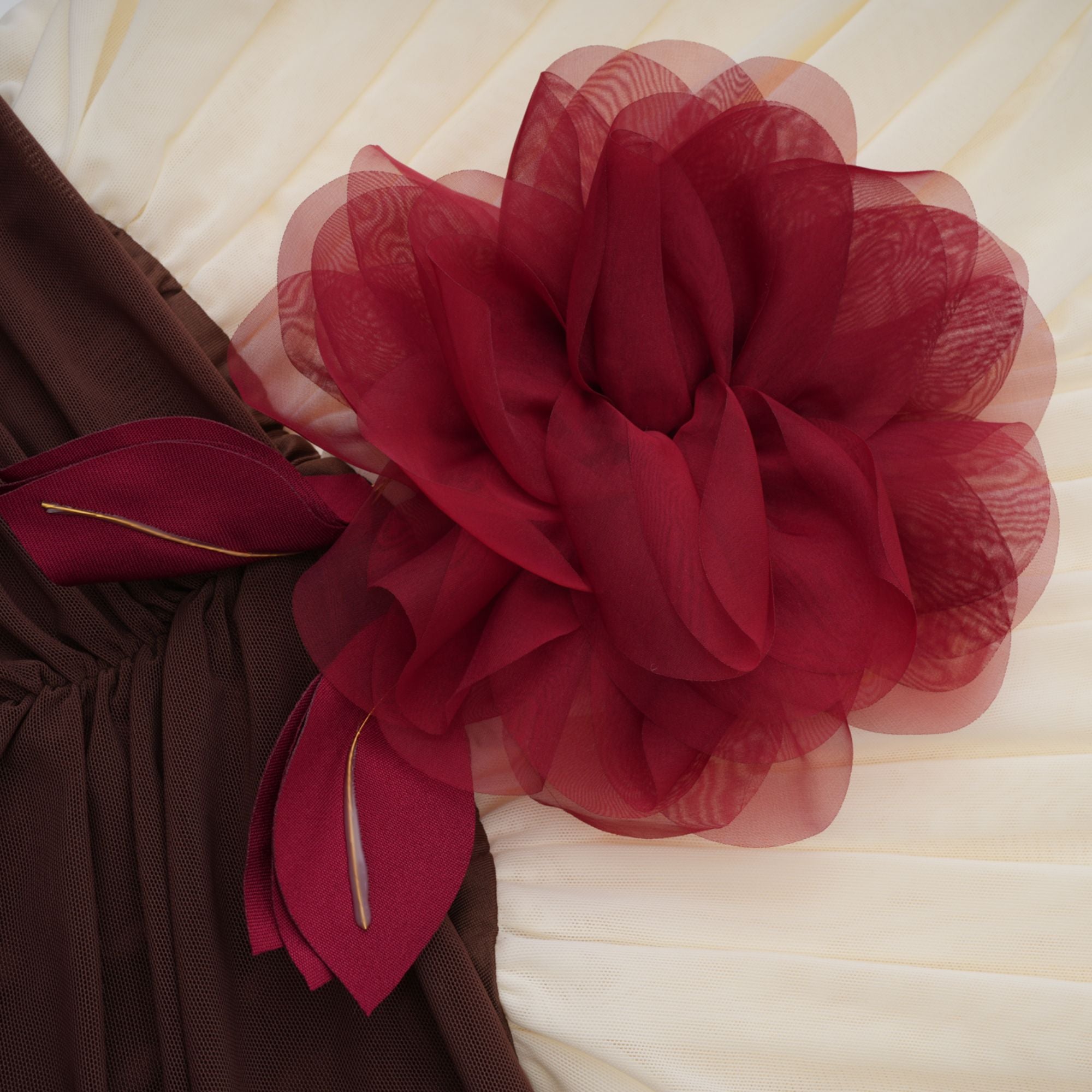 Léontine color-blocked flower-brooch ruched midi dress