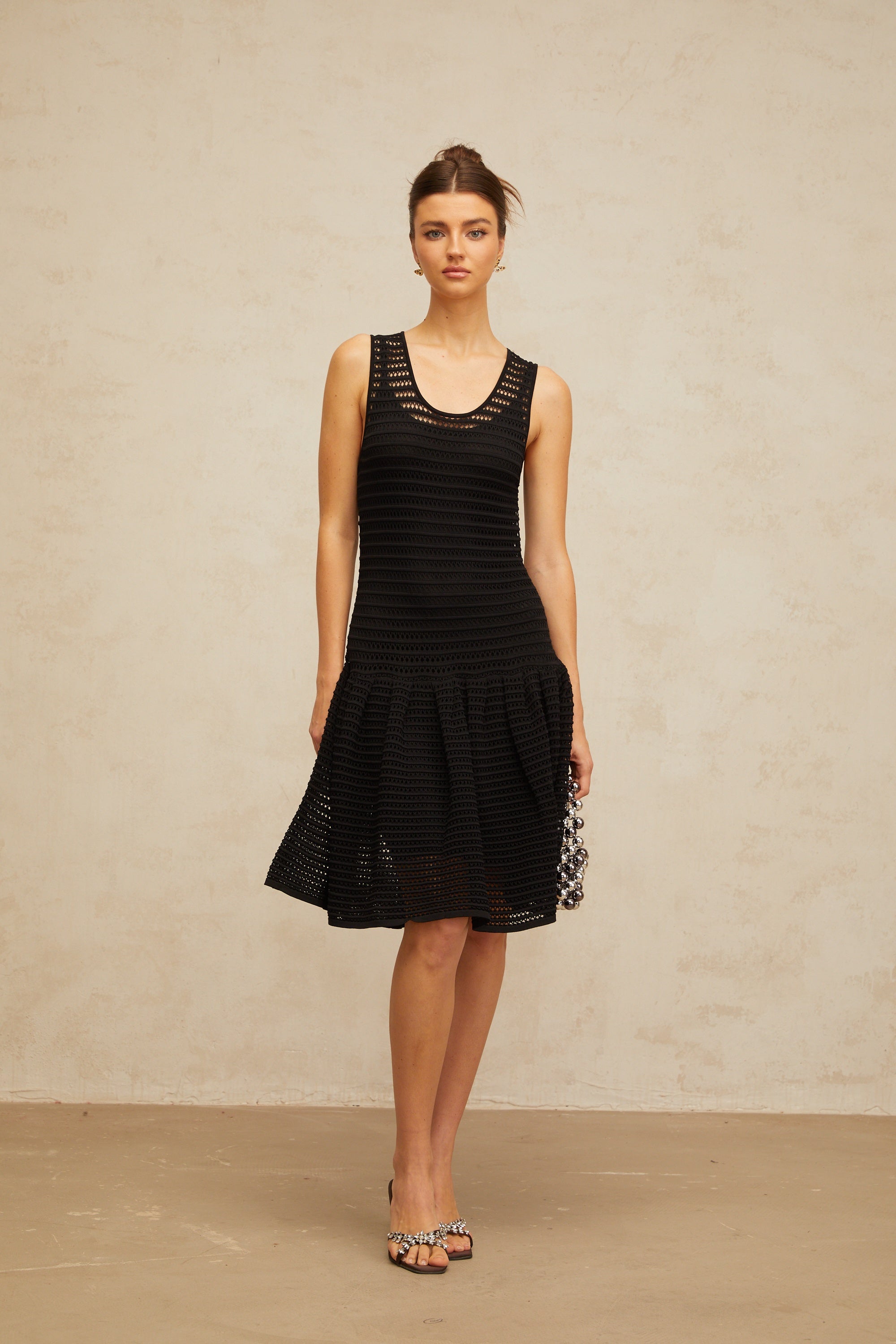 Maelle black flounced pointelle-knit mini dress