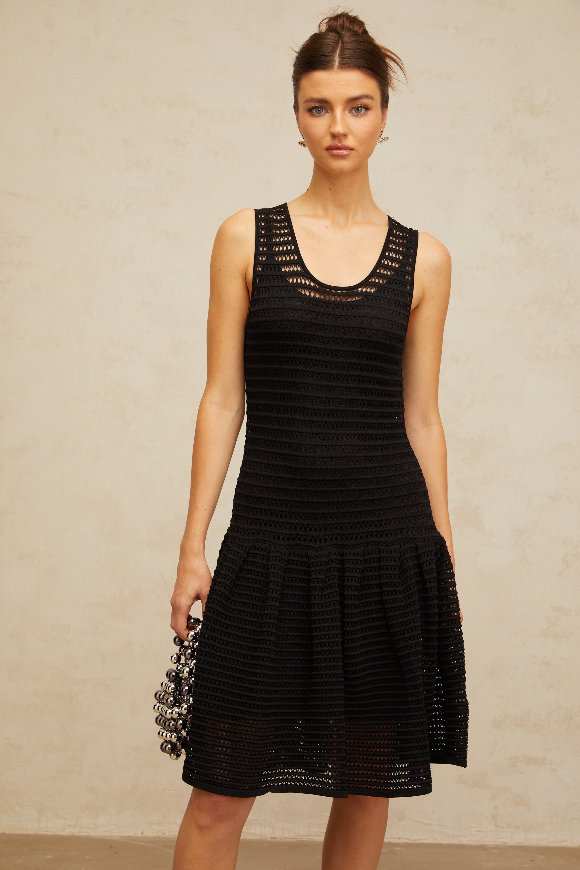 Maelle black flounced pointelle-knit mini dress